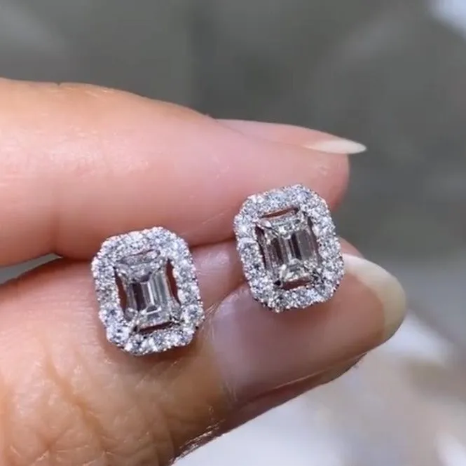 0.92CT T.W. Diamond Emerald Cut Halo Studs