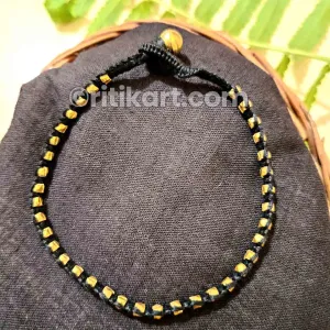 Ancient Brass Anklet with Golden Dhokra Beads in Black Thread