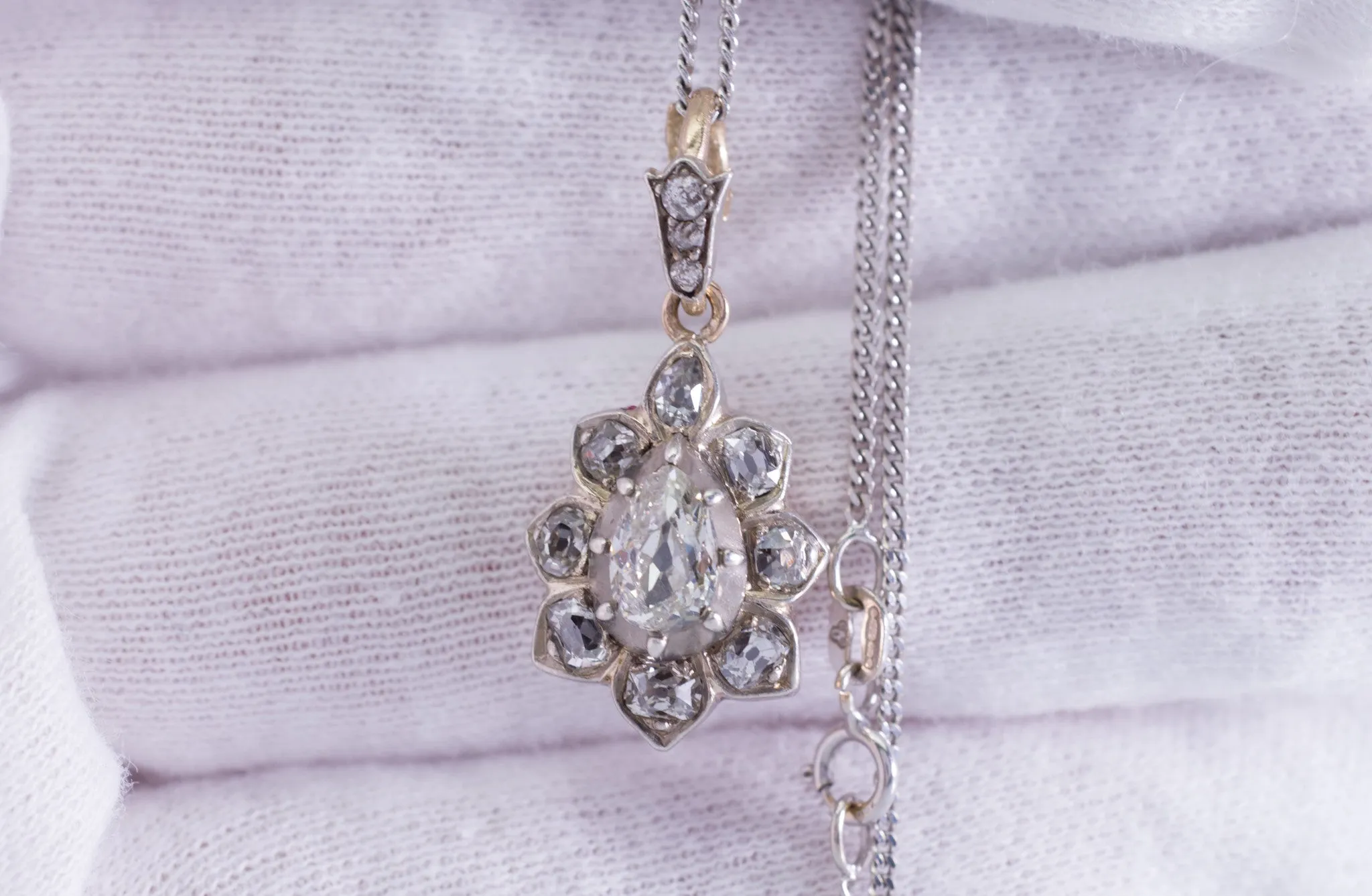 ANTIQUE PEAR CUT DIAMOND PENDANT IN SILVER AND GOLD