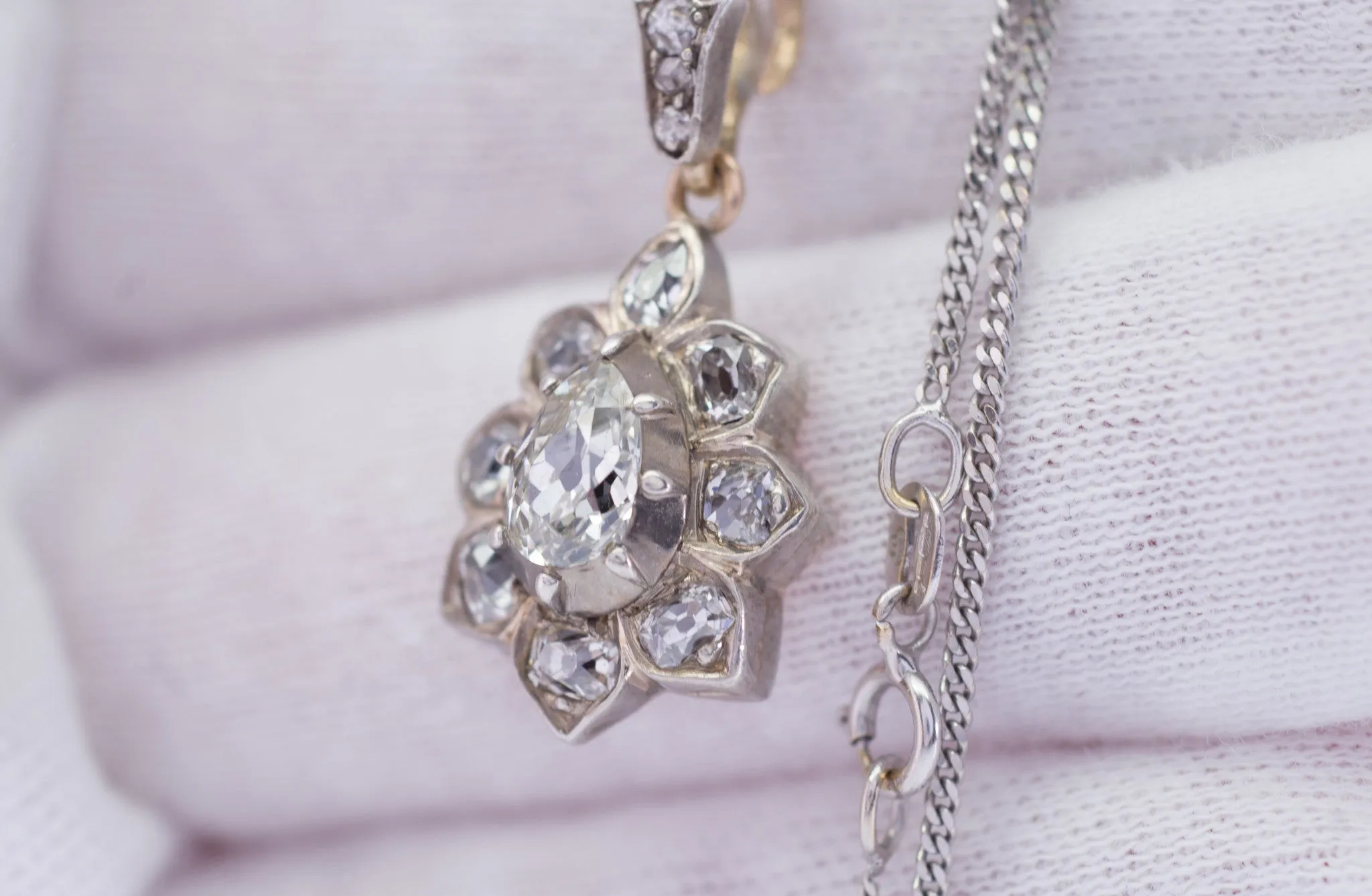ANTIQUE PEAR CUT DIAMOND PENDANT IN SILVER AND GOLD