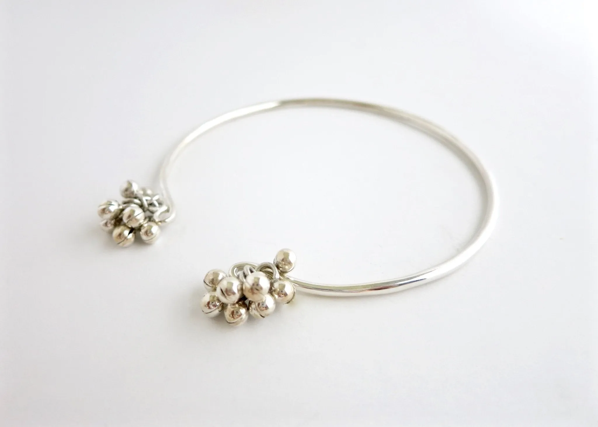 Artistic, bangle anklet with silver ball cluster- can also be worn as an arm band