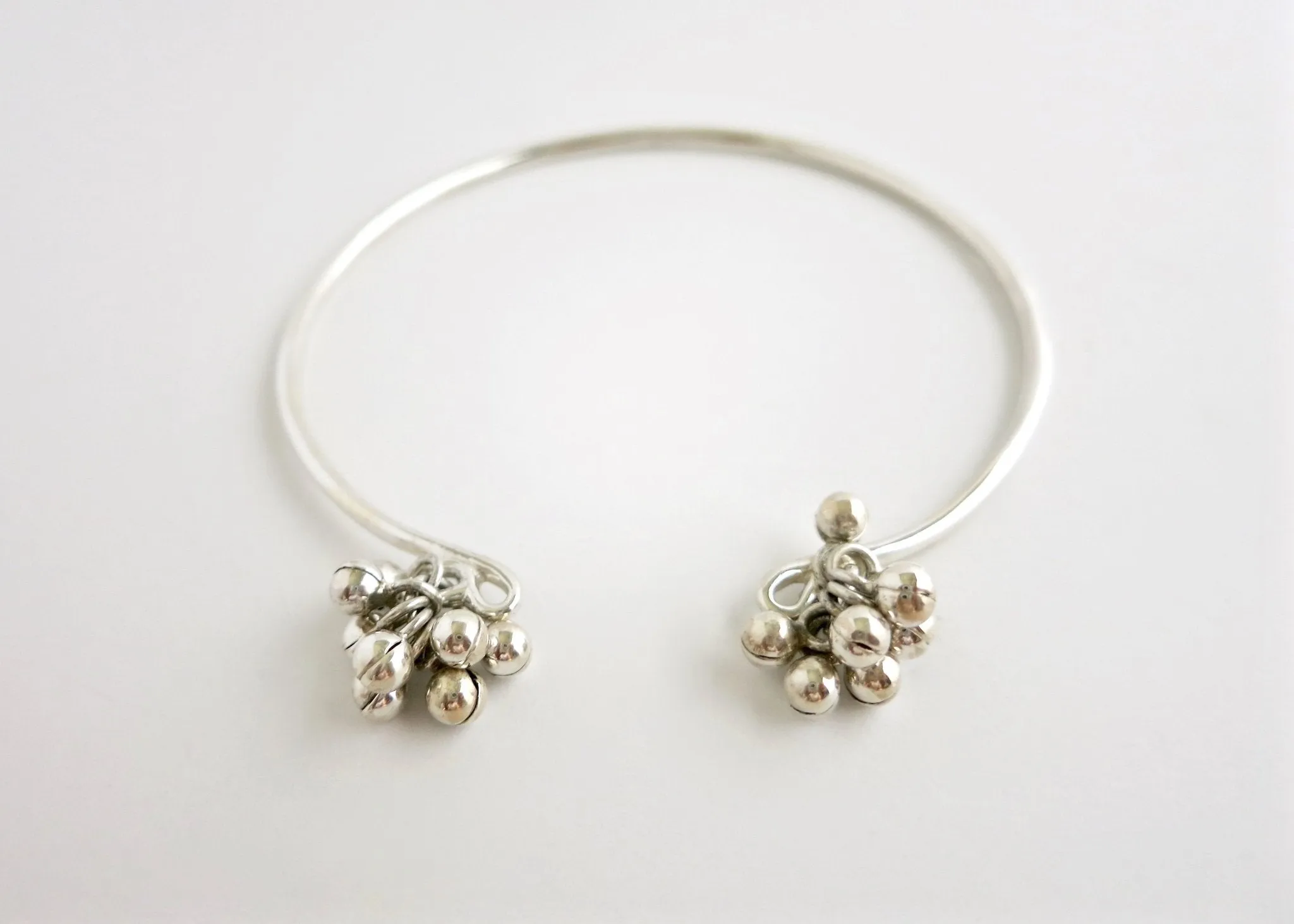 Artistic, bangle anklet with silver ball cluster- can also be worn as an arm band