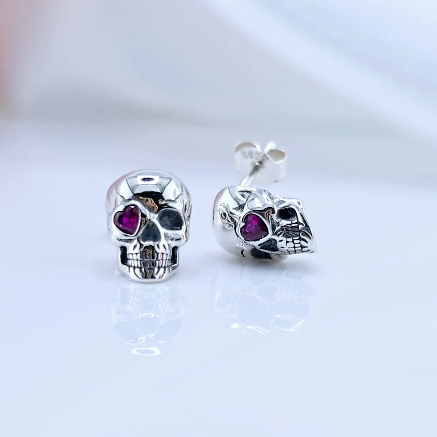 Cool Skull Pink Heart-shaped Diamond Stud Earrings