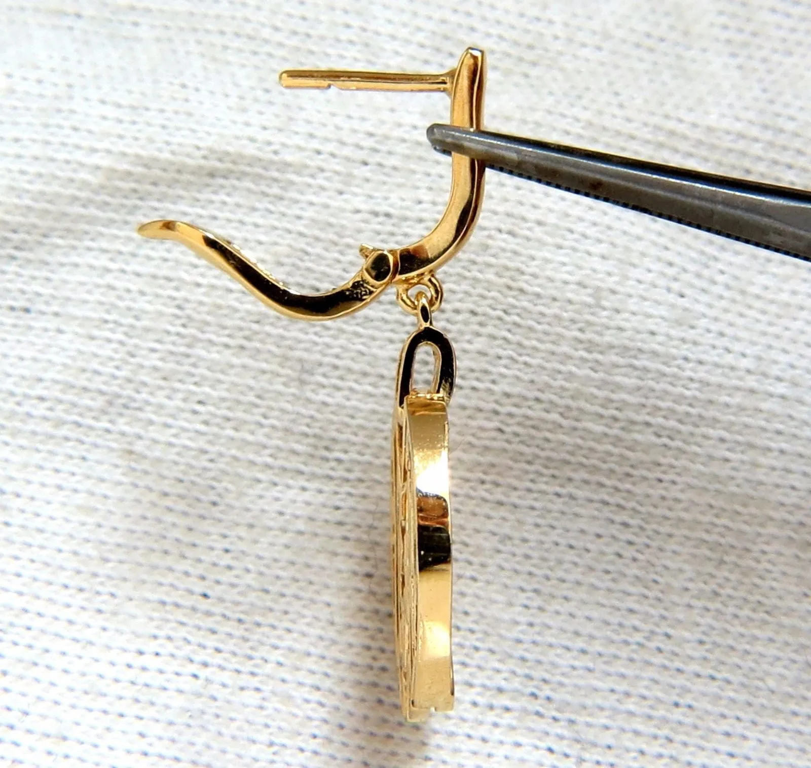 Cosmopolitan Mod X Diamond dangle earrings 14kt