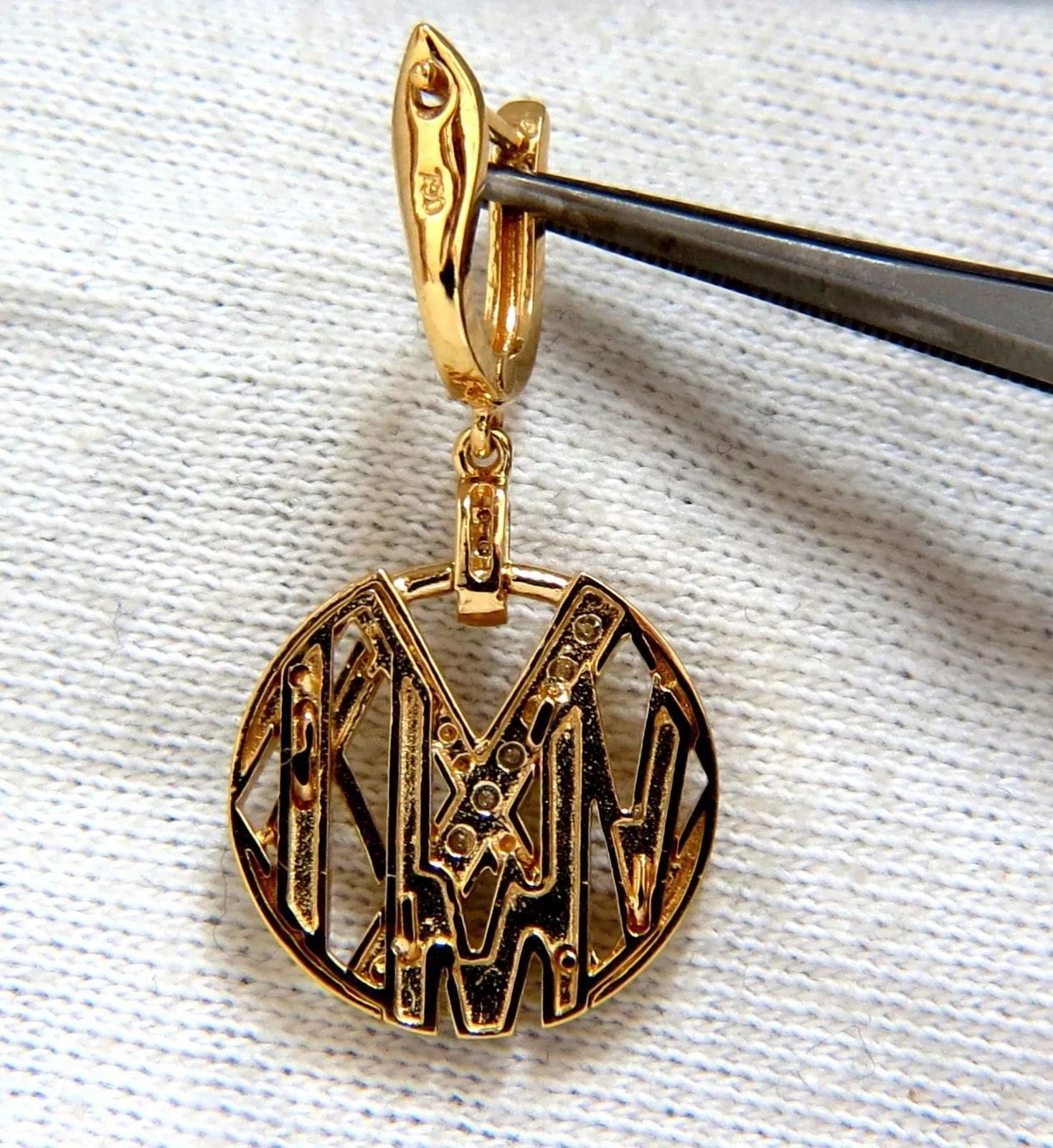 Cosmopolitan Mod X Diamond dangle earrings 14kt