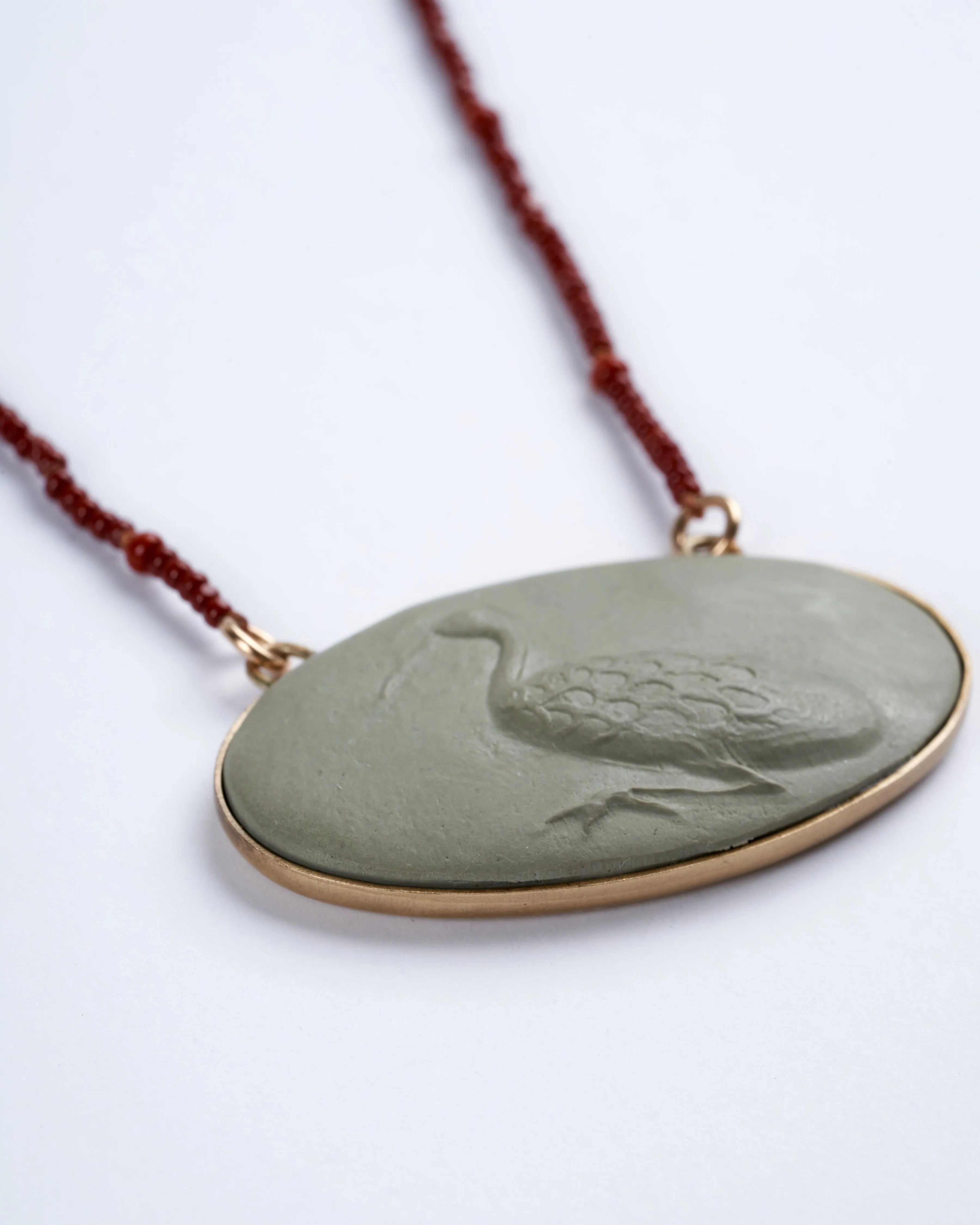 crane cameo pendant - lt green