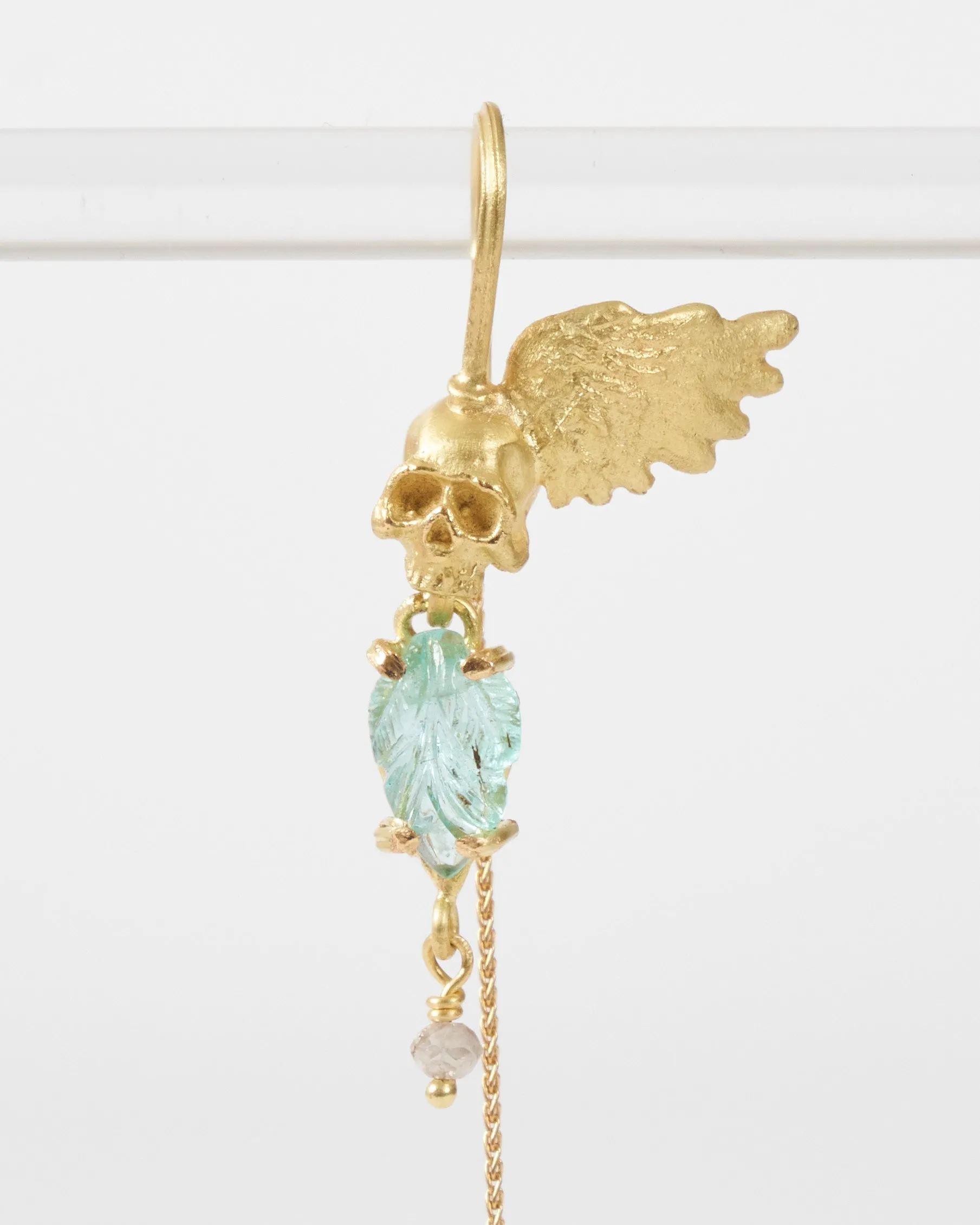 emerald skull earrings