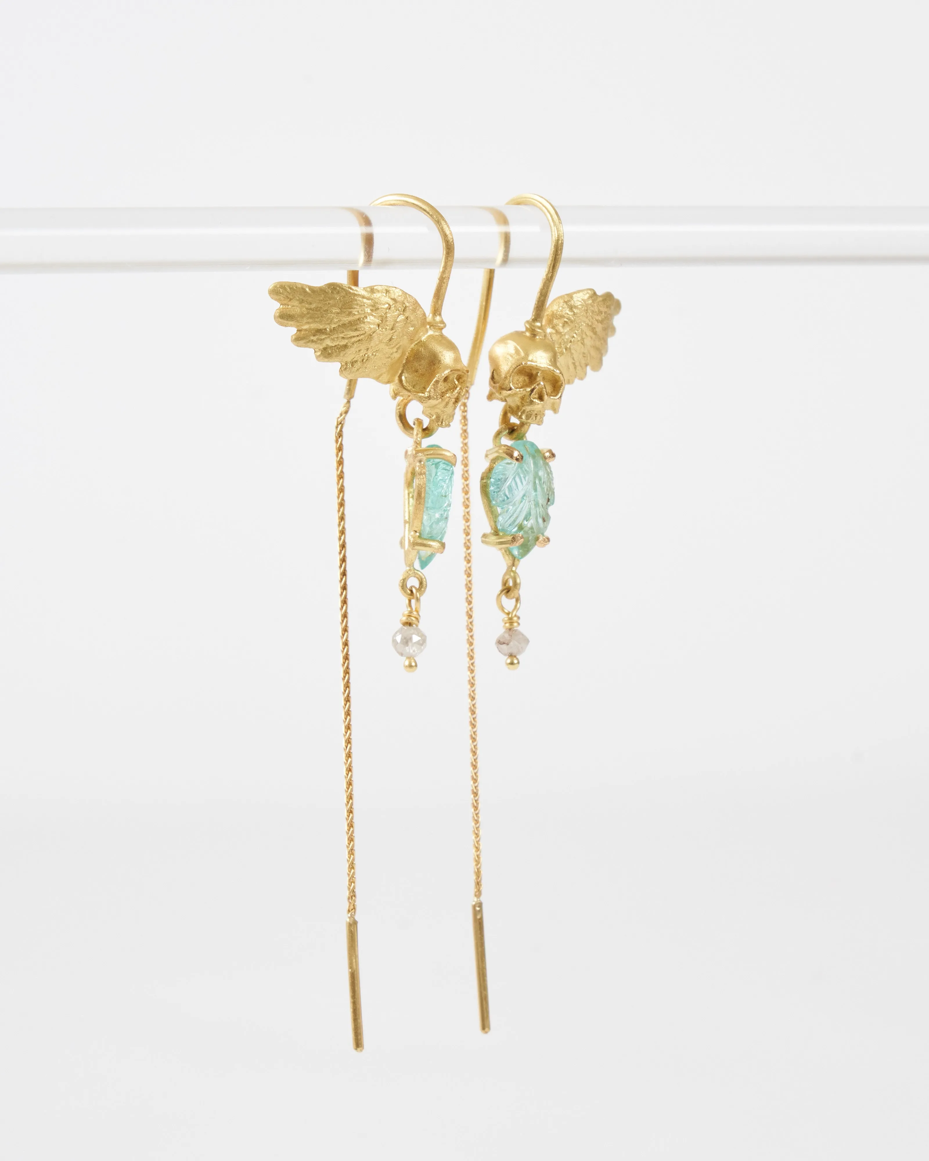 emerald skull earrings