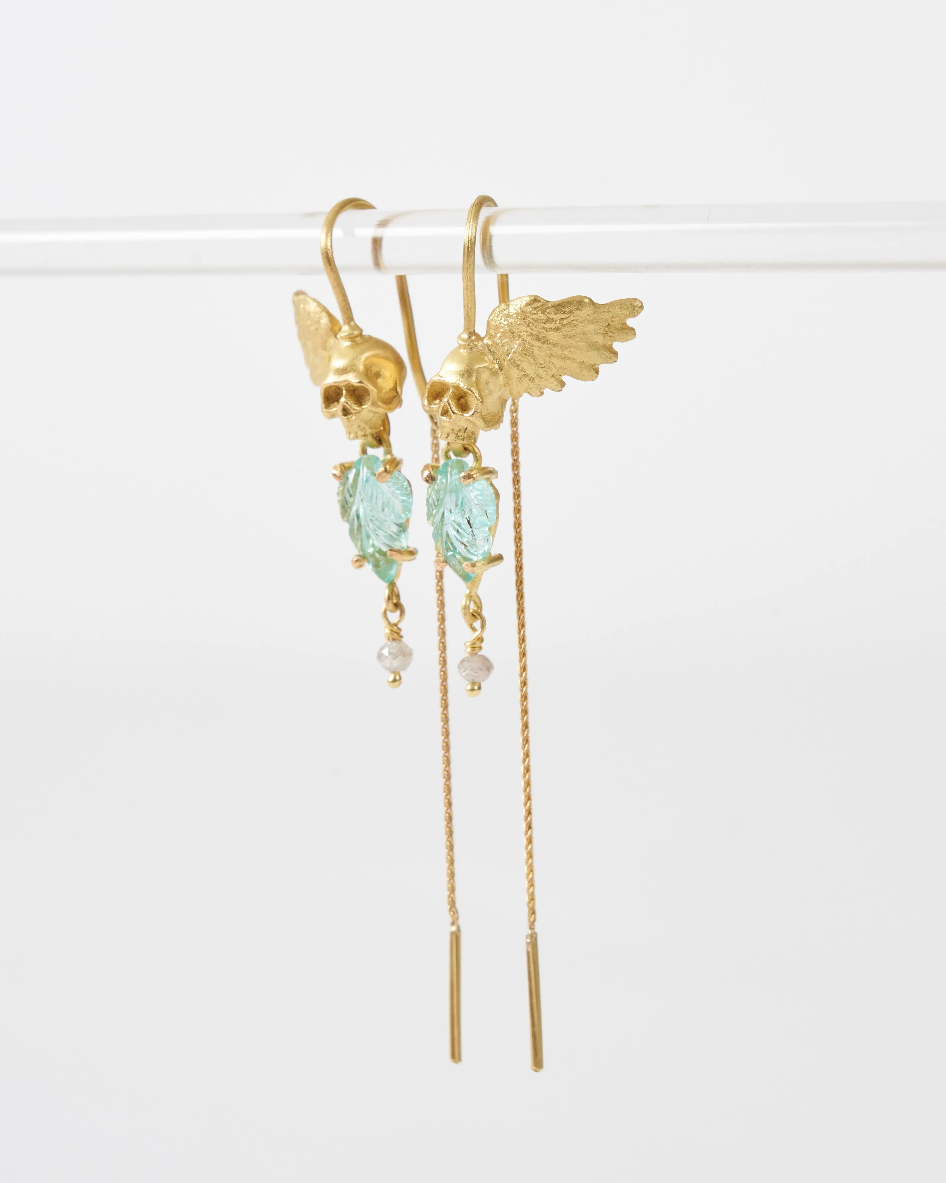 emerald skull earrings
