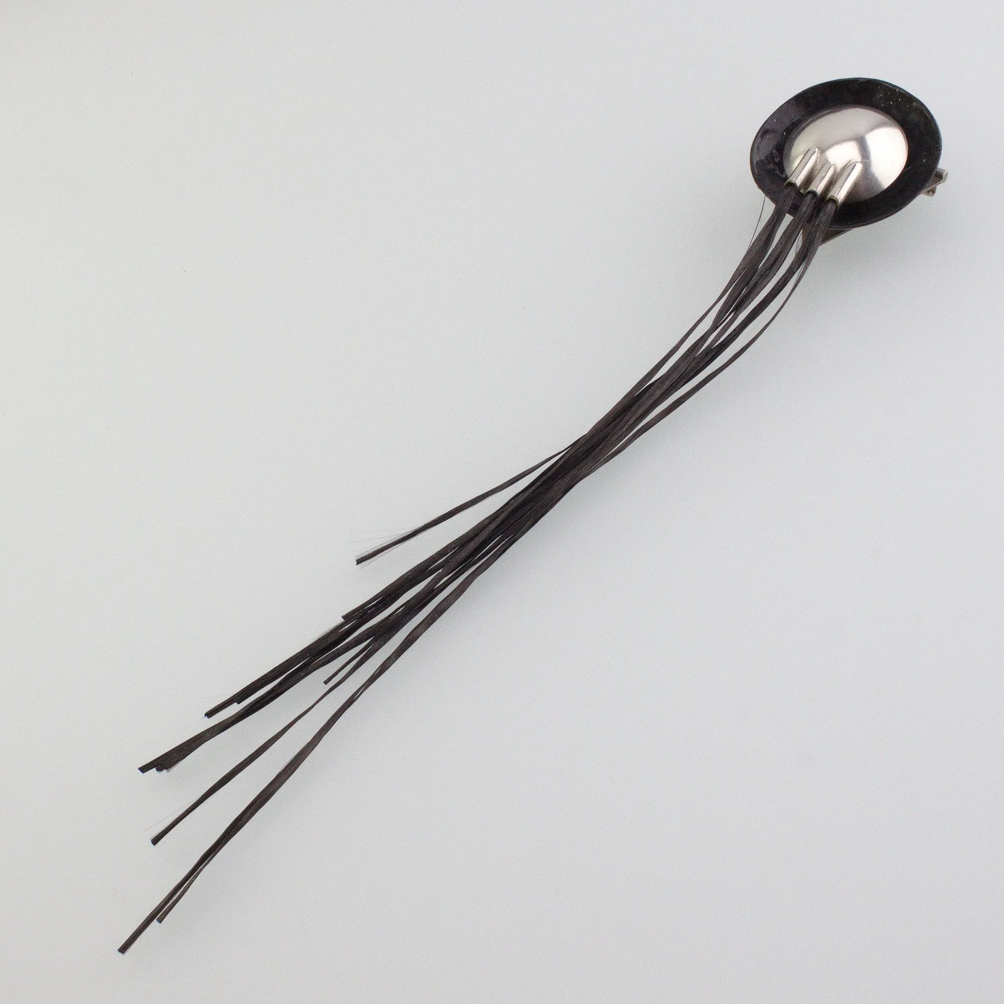 'FLARING' handmade sterling silver brooch with black carbon fibre