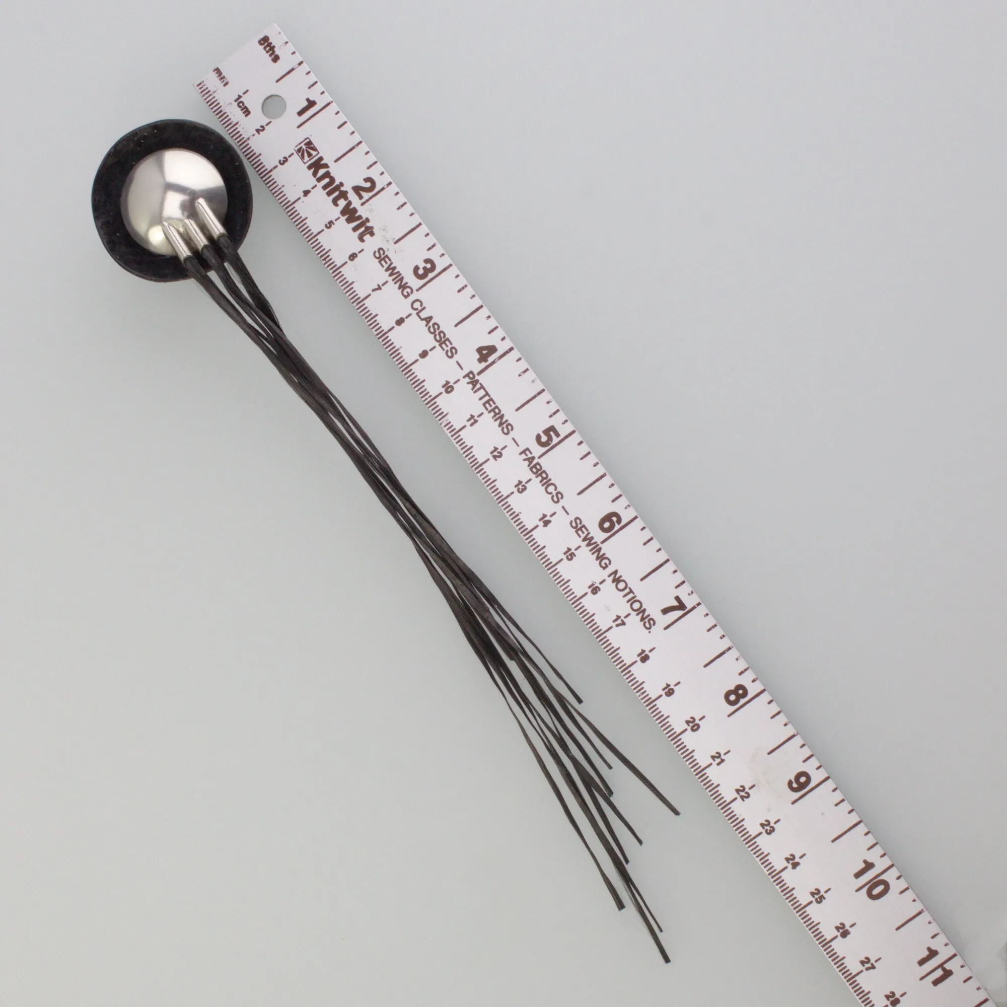 'FLARING' handmade sterling silver brooch with black carbon fibre