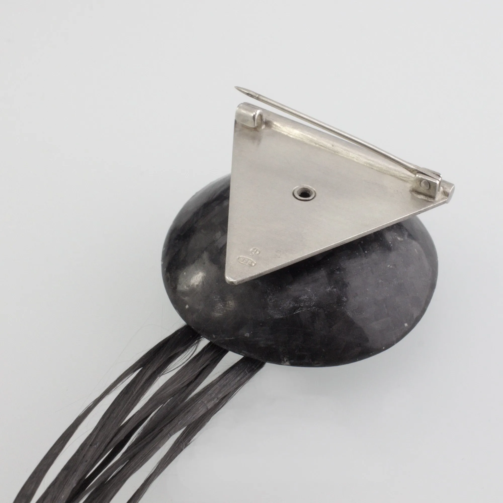 'FLARING' handmade sterling silver brooch with black carbon fibre