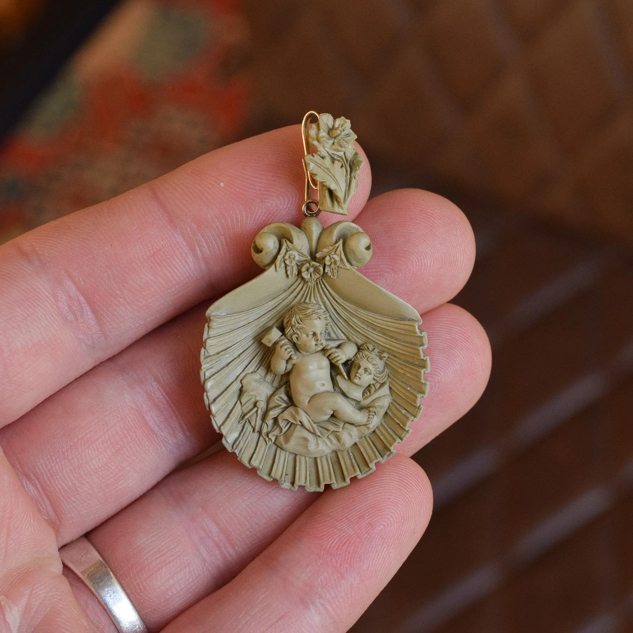 Mid-Victorian "Cupid Carving Aphrodite" Lava Cameo Pendant