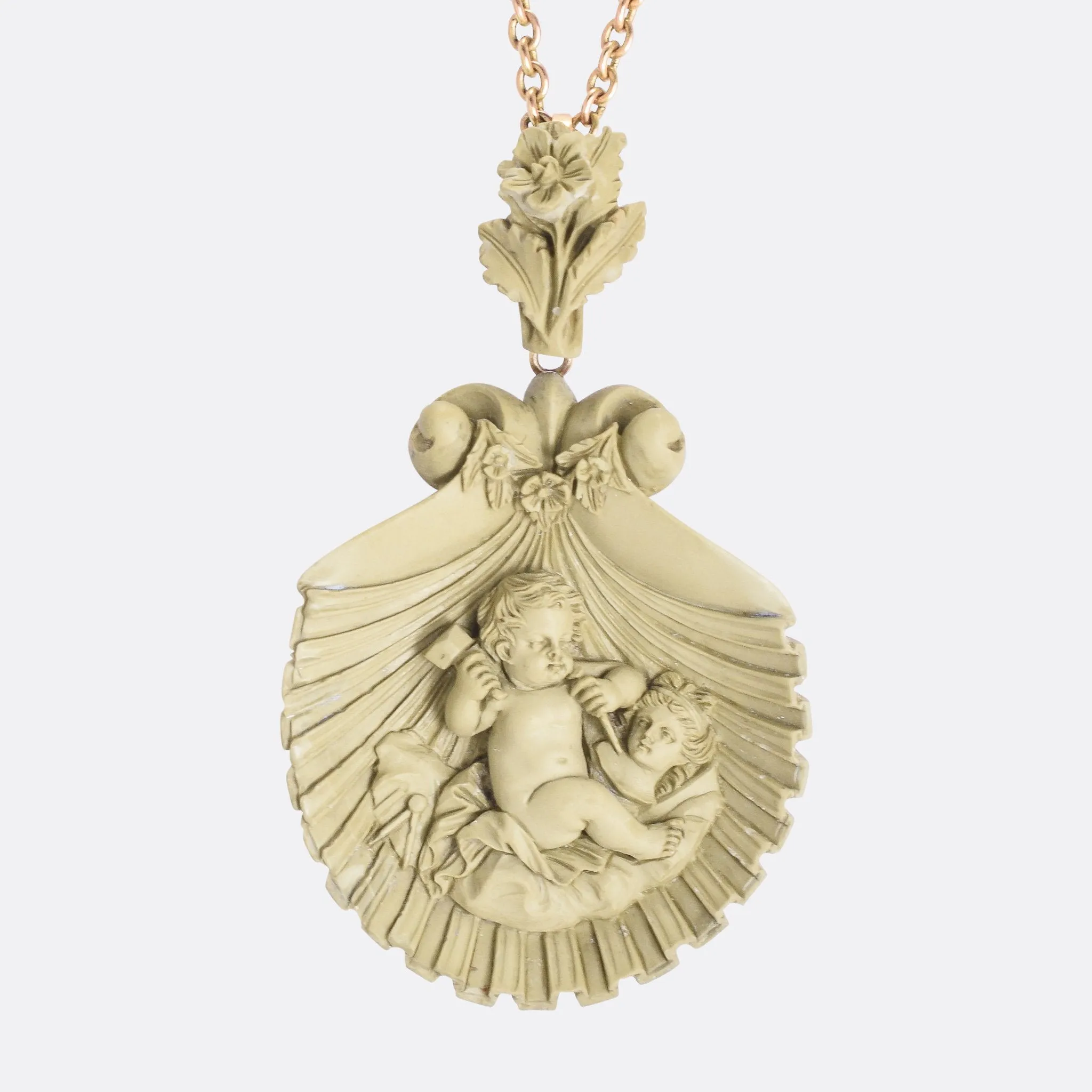 Mid-Victorian "Cupid Carving Aphrodite" Lava Cameo Pendant
