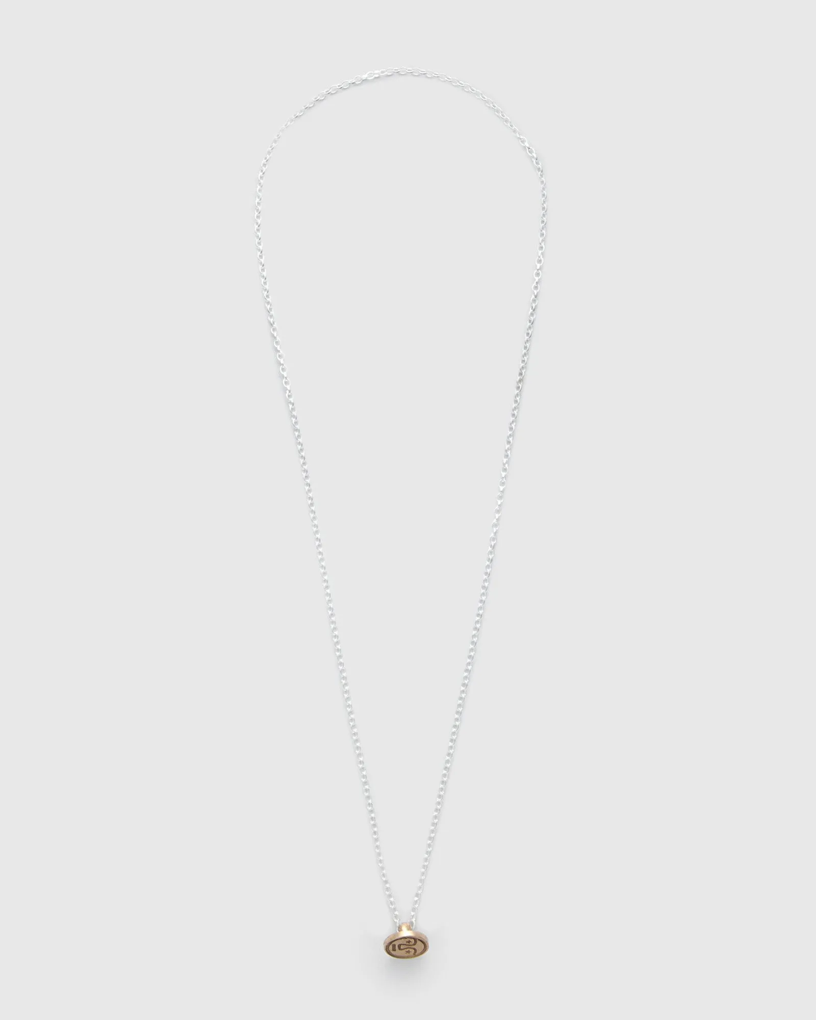 Penna Button Necklace in Brass and Silver