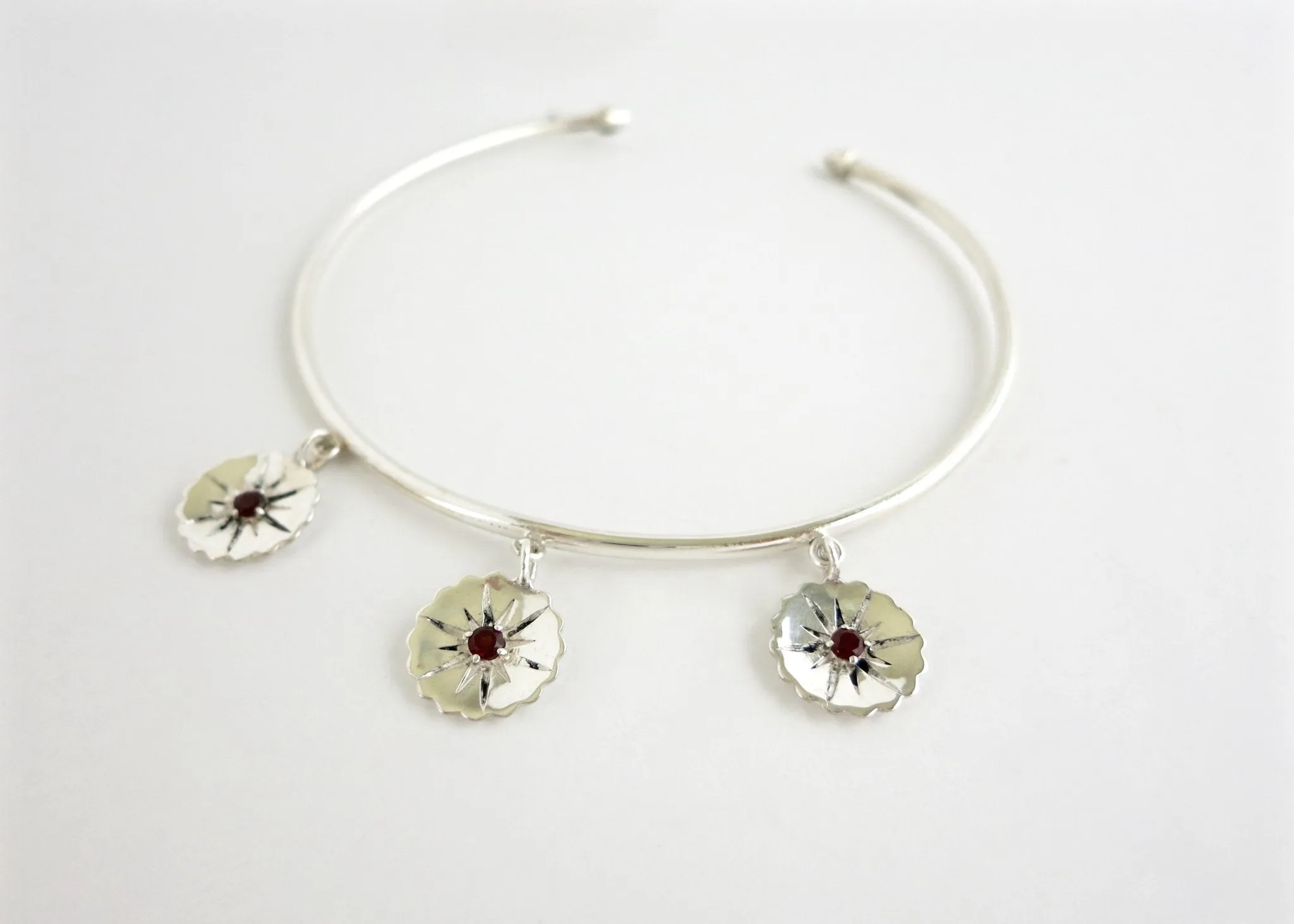 Ravishing, bangle anklet with 3 dangling floral units- can also be worn as an arm band