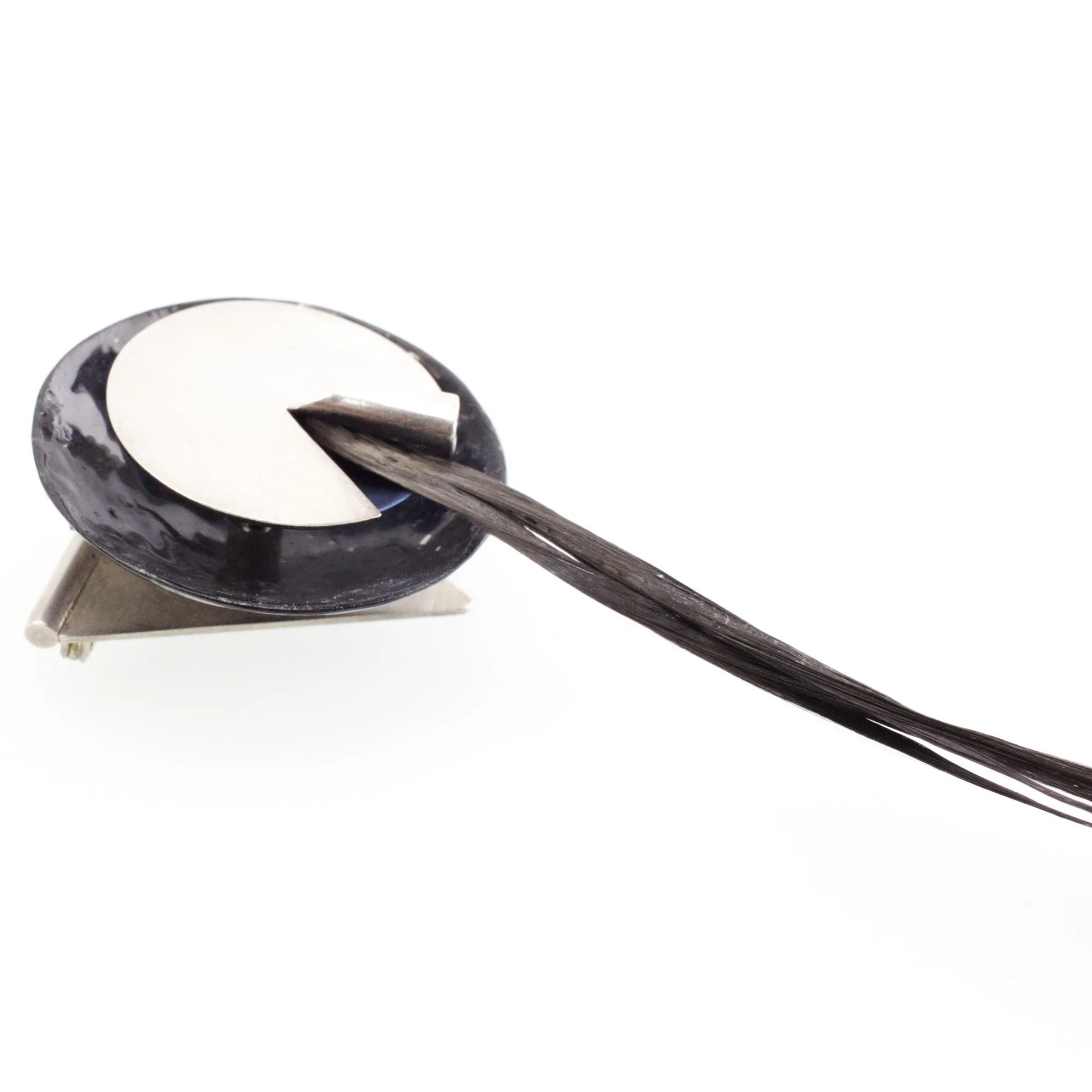 'REVEAL' handcrafted sterling silver brooch with black carbon fibre