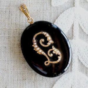Vintage Large onyx and pearl mourning locket in 14k yellow gold